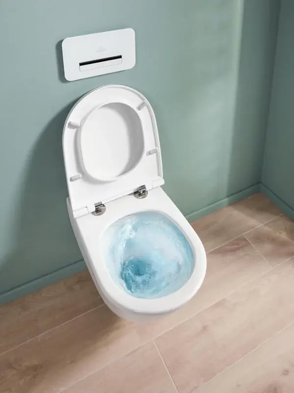 universo-twistflush-bathroom-white-toilet-flushes-on-light-green-background+(1)
